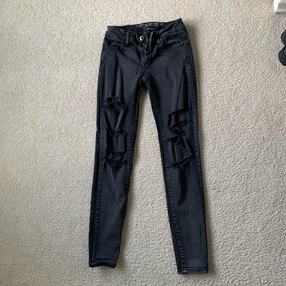 Ripped black wash super stretch skinny jean
